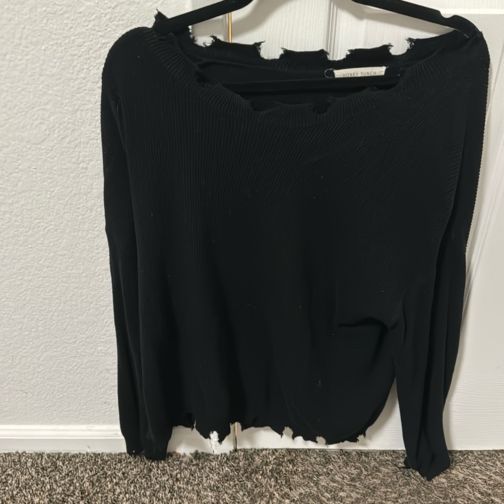 Ripped neck sweater